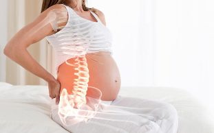 maux de dos pendant la grossesse entraîne des