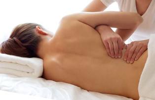 les maux de dos après la livraison de massage